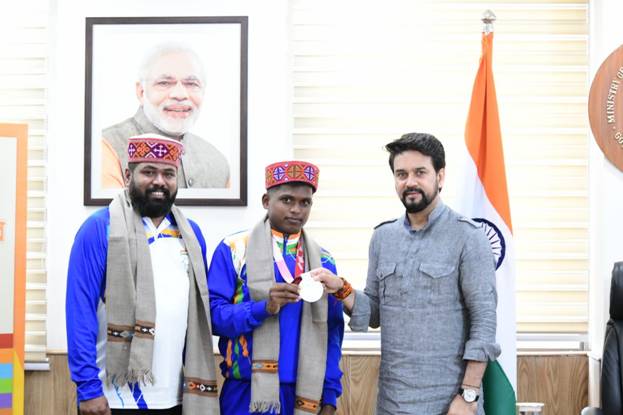 You are currently viewing Sports Minister  Anurag Singh Thakur felicitates Paralympics Tokyo 2020 silver medallist Mariyyapan T and his coach Raja B